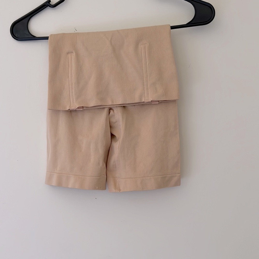 Nude, form fitting spandex shape wear